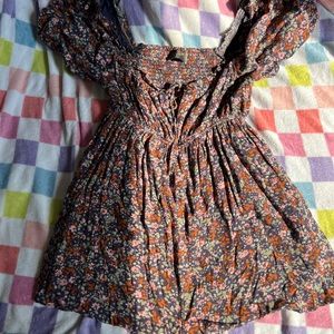 Dress Forum Purple Floral Romper Soft Tie Detail Perfect for Fall or Summer